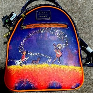 Loungefly Blue Disney Pixar Coco Marigold Bridge Mini Backpack Bag